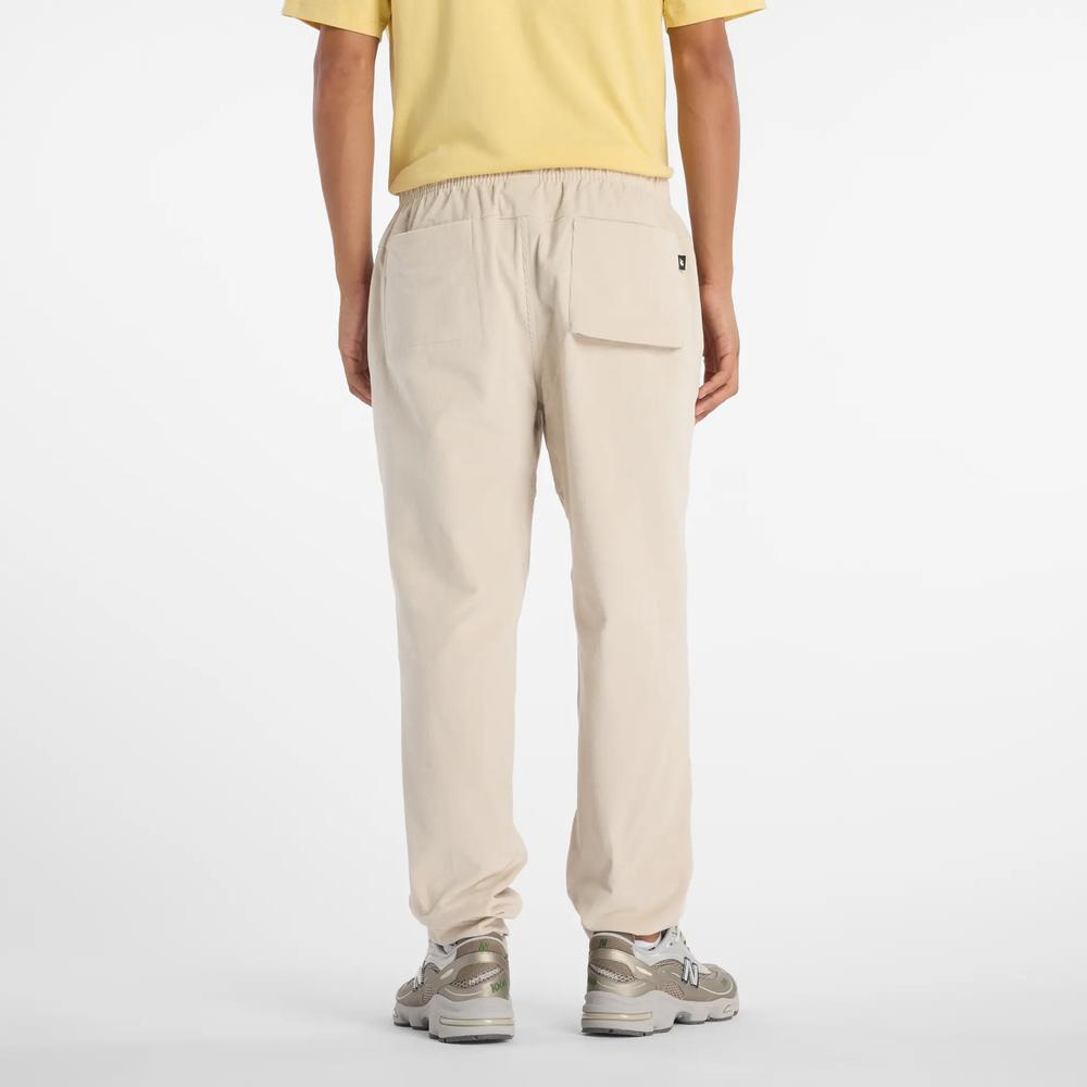 Férfi nadrág New Balance MP53521TWF - bézs