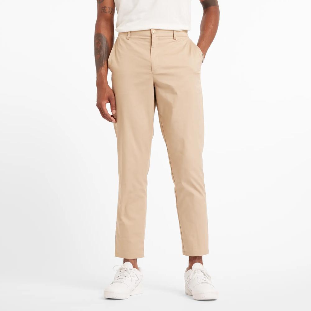 Férfi nadrág New Balance MP43554SOT - bézs
