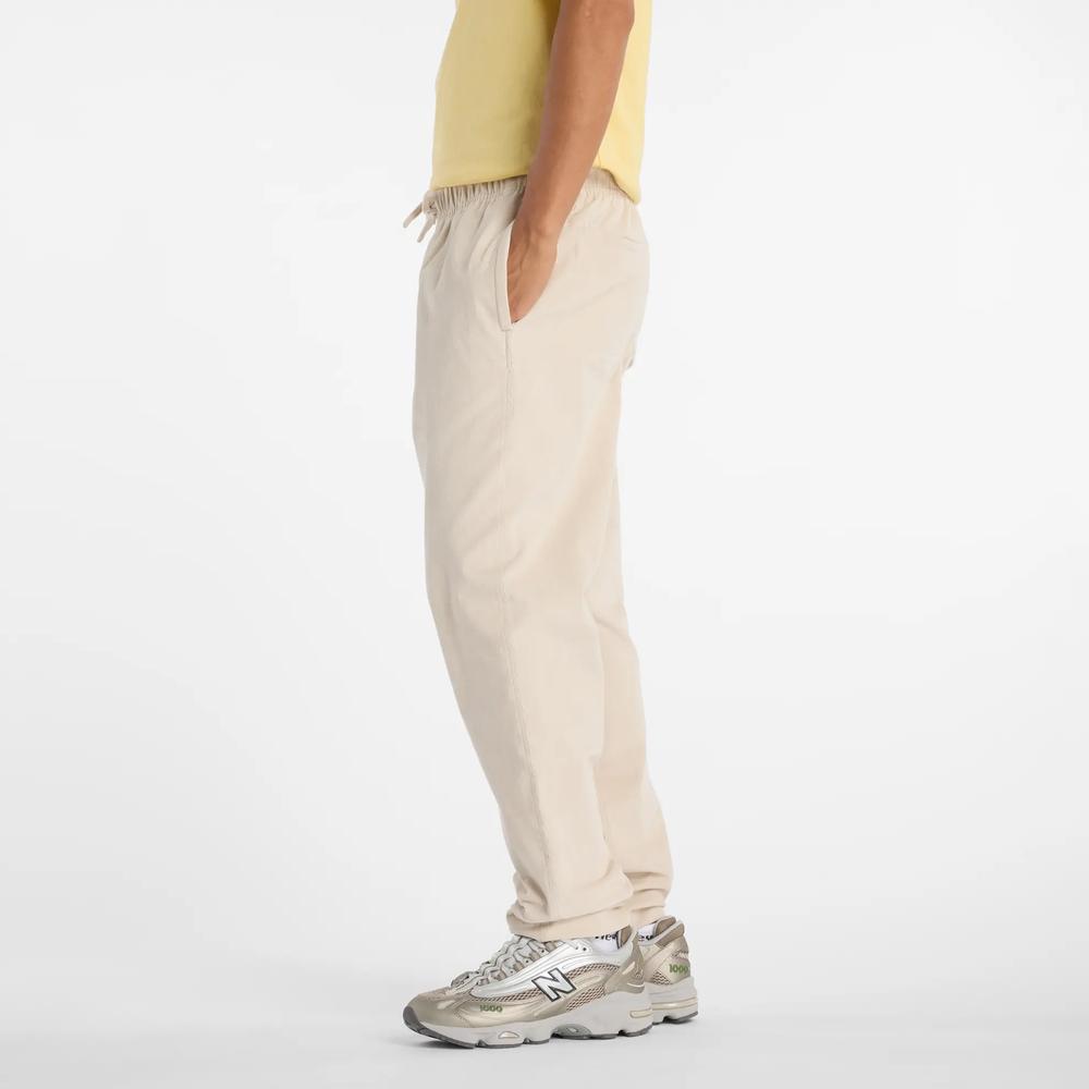 Férfi nadrág New Balance MP53521TWF - bézs