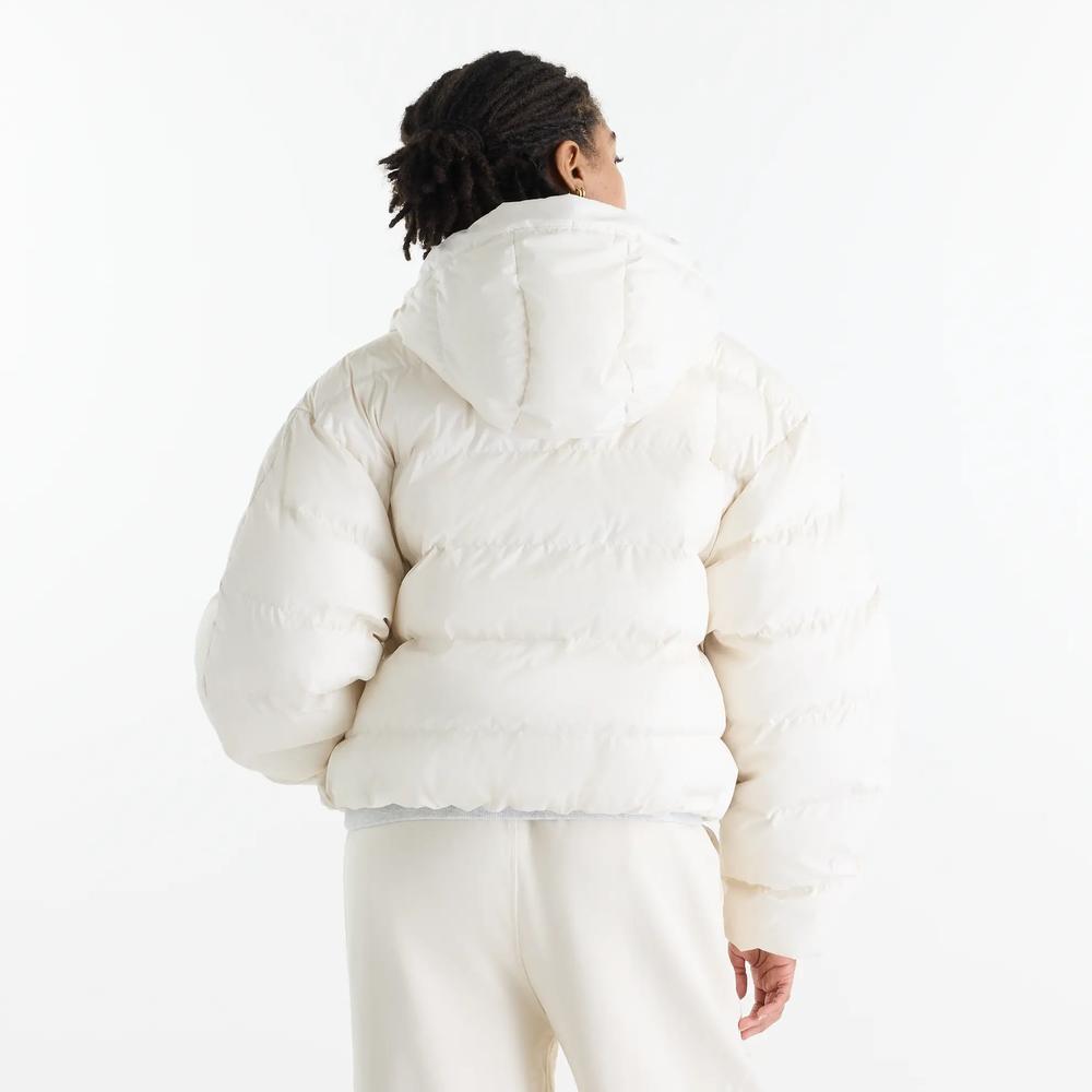 Női bunda New Balance Boston Puffer WJ62V5SNLIN - bézs
