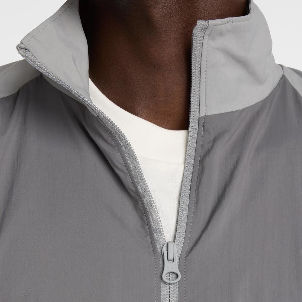 Férfi futódzseki New Balance MJ61J73YCAS - szürke