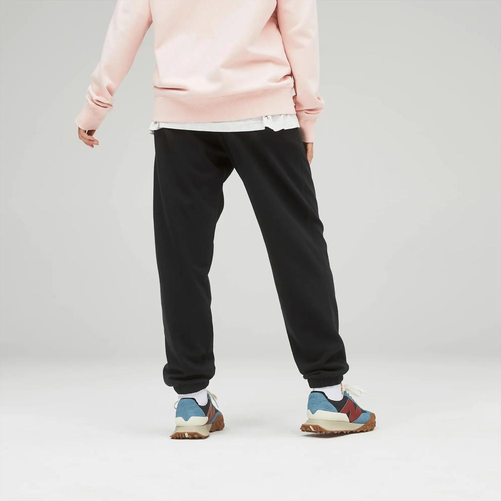 Melegítőnadrág New Balance UP21500BK - fekete