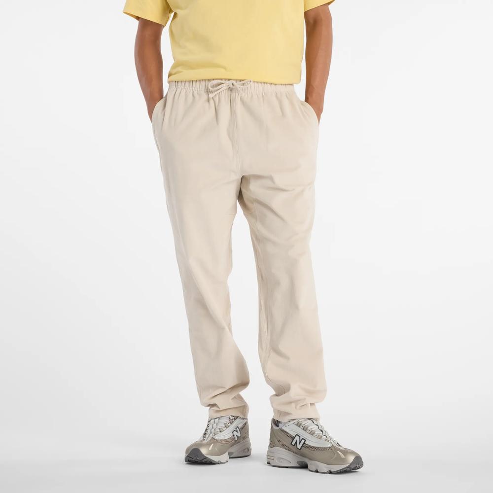 Férfi nadrág New Balance MP53521TWF - bézs