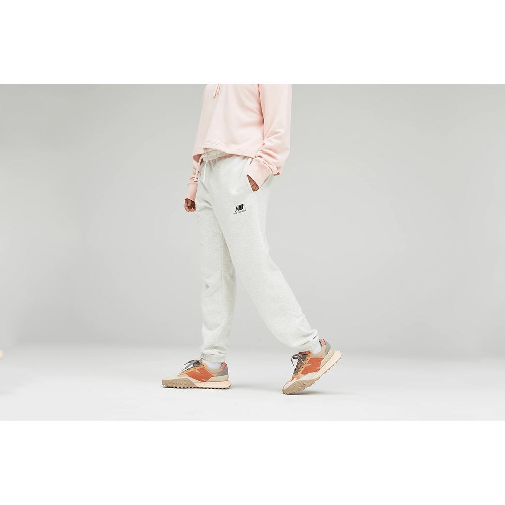 Melegítőnadrág New Balance UP21500SAH - szürke