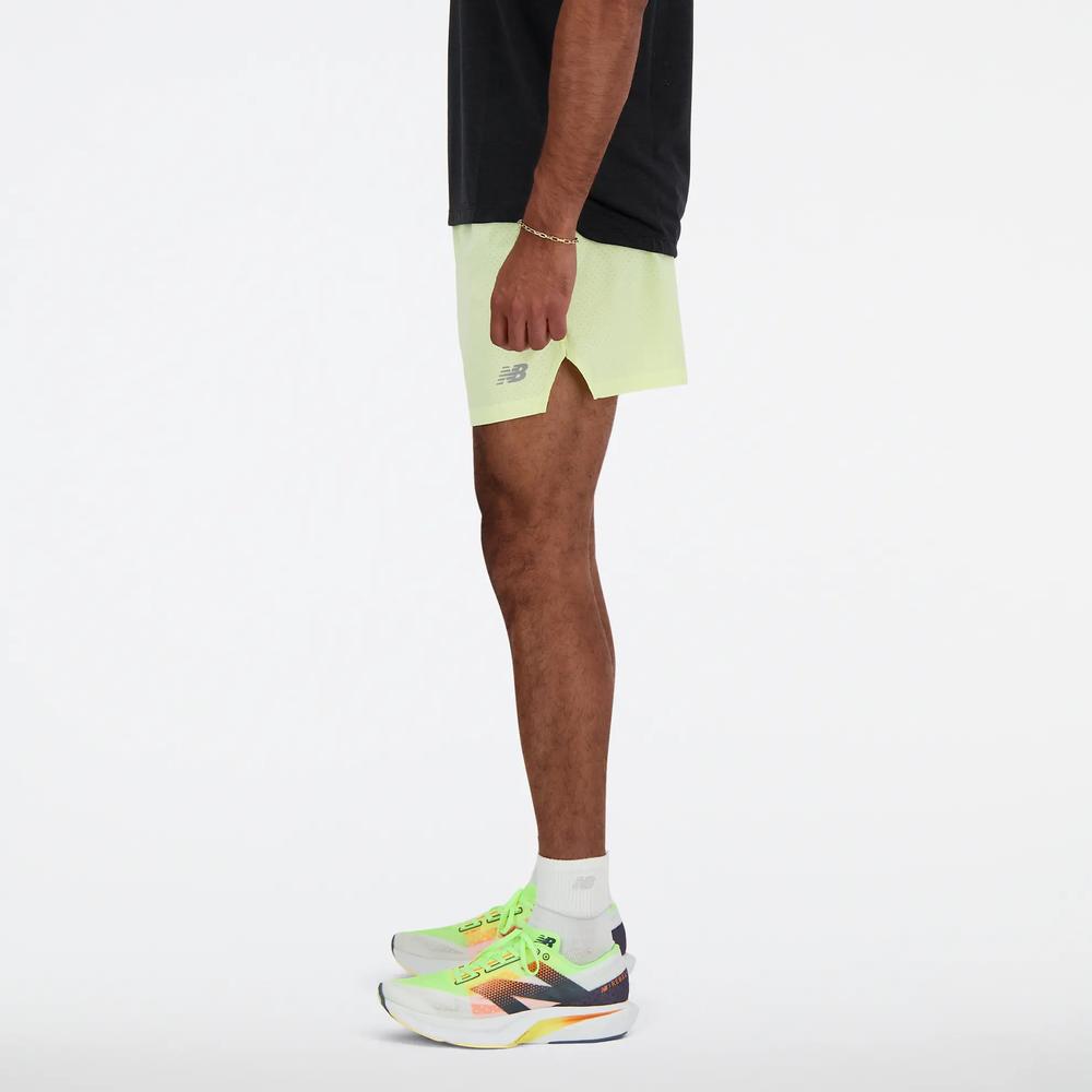 Férfi futónadrág New Balance MS41286LLT - sárga