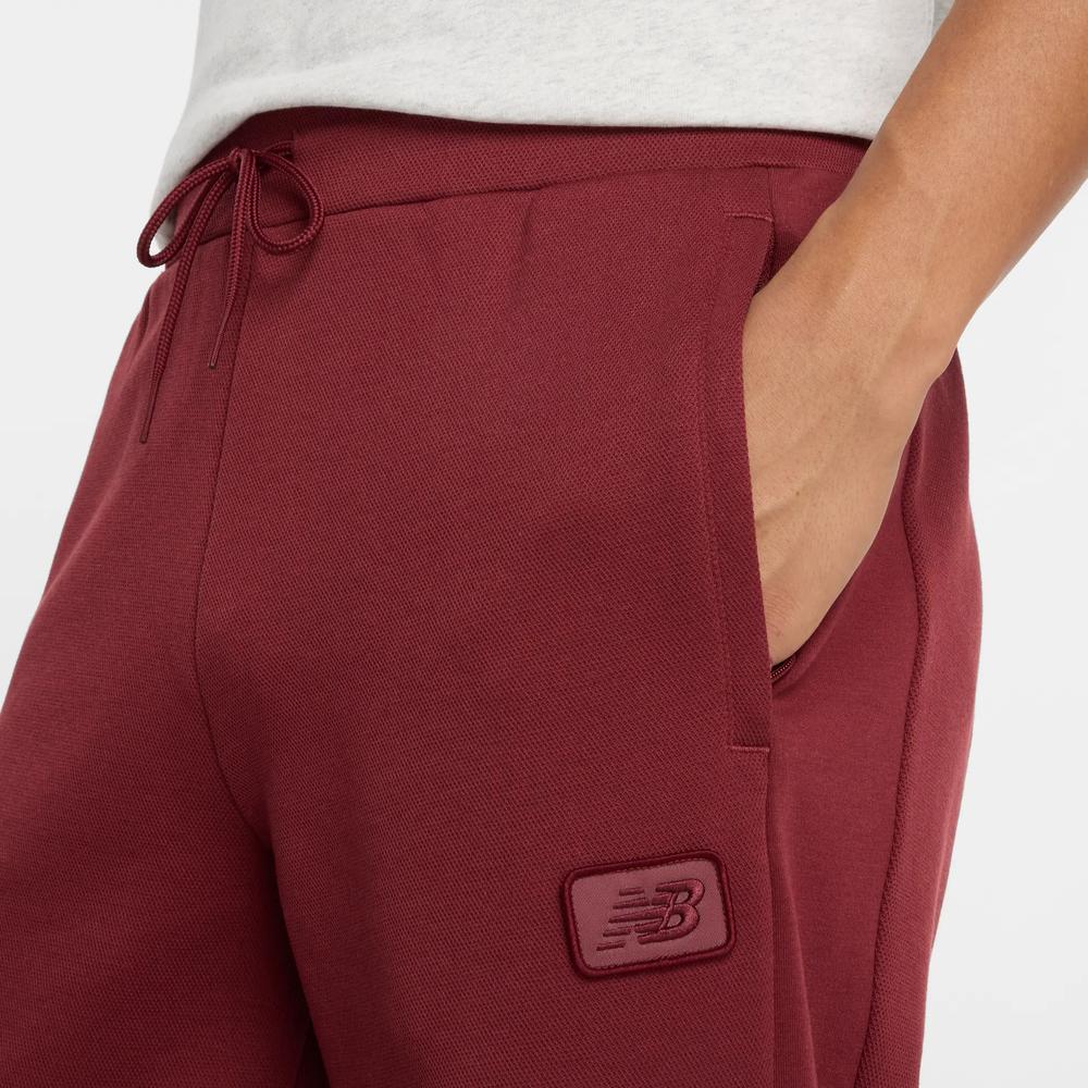 Férfi nadrág New Balance MP53501MHB - gesztenyebarna