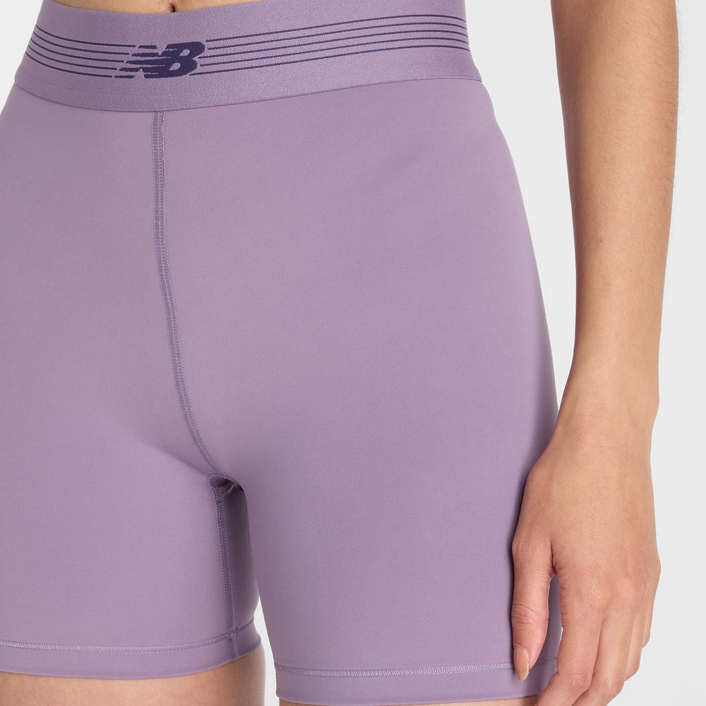 Női futónadrág New Balance WB61E4GEAA5 - lila