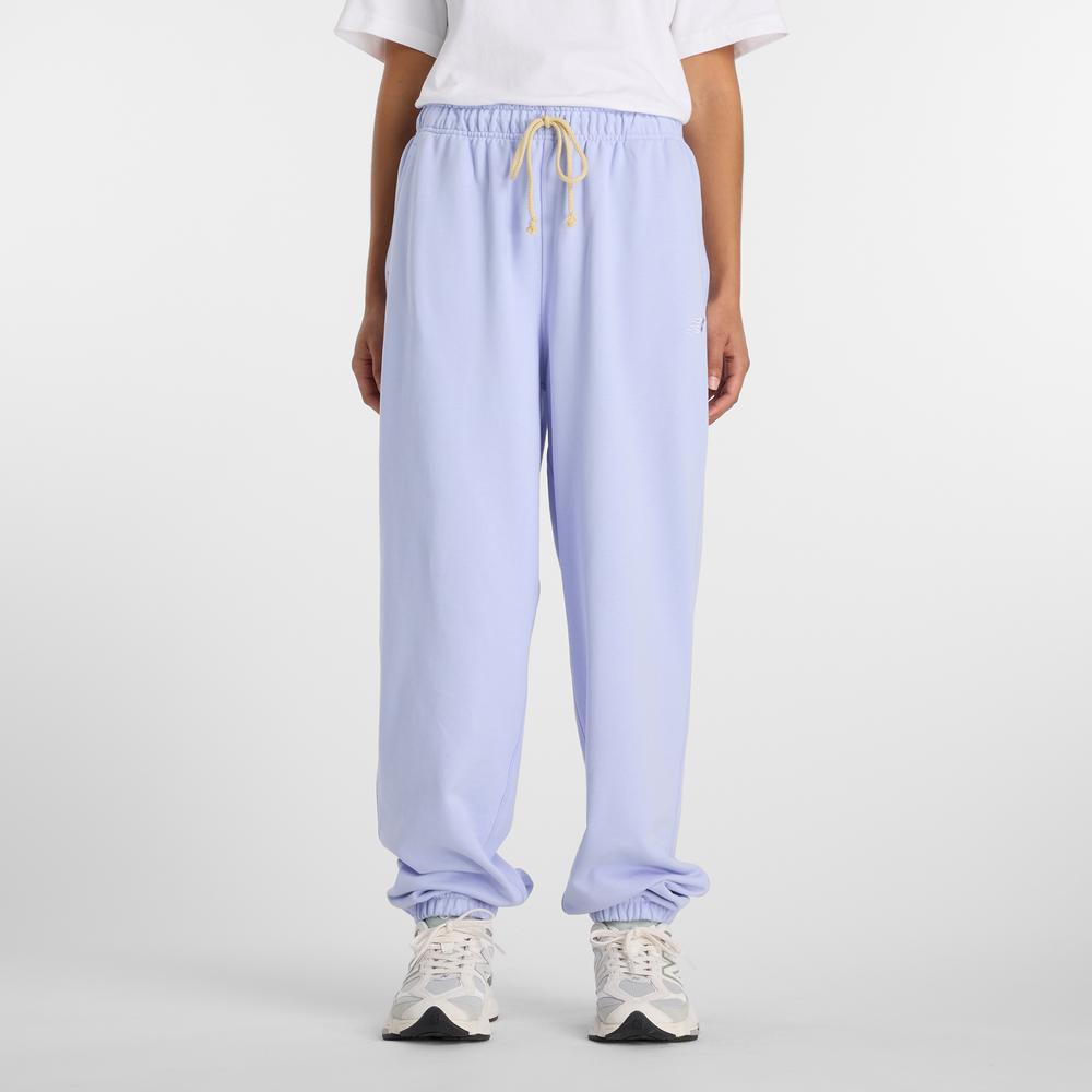 Női nadrág New Balance WP41513DYK - lila