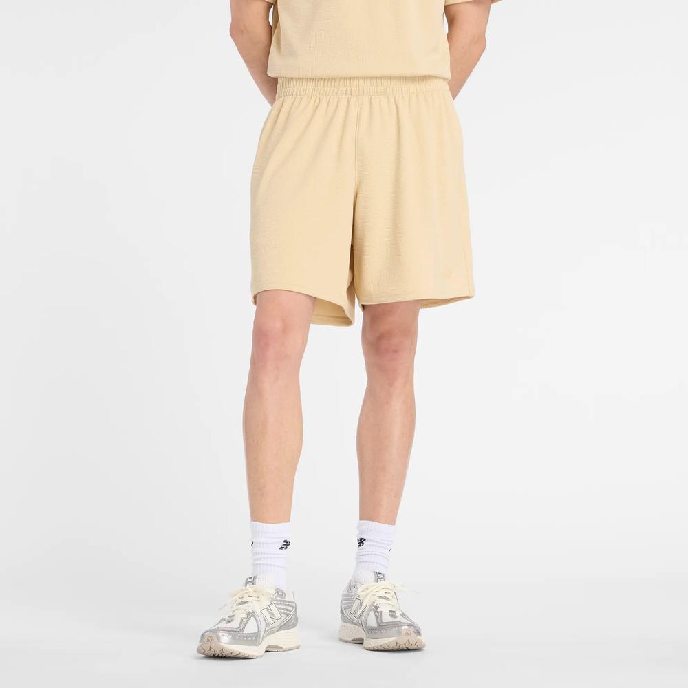 Férfi futónadrág New Balance MB61V17CABC - sárga