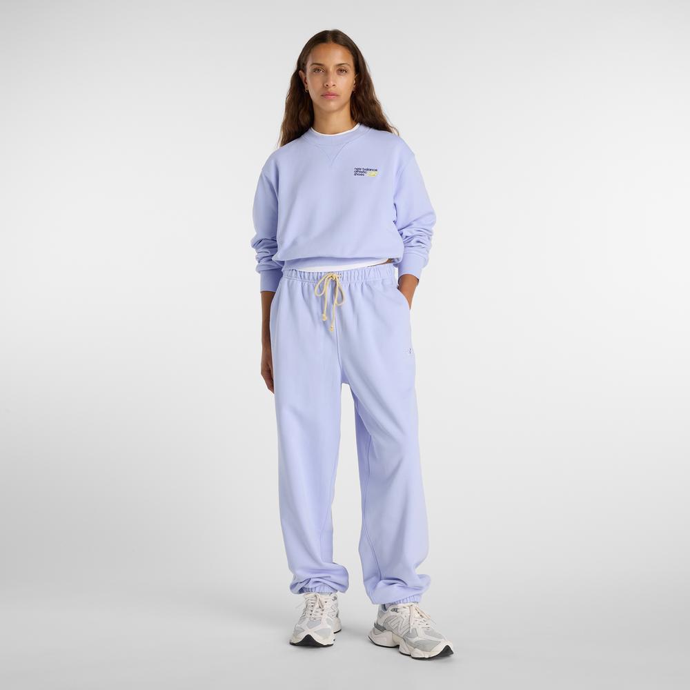 Női nadrág New Balance WP41513DYK - lila