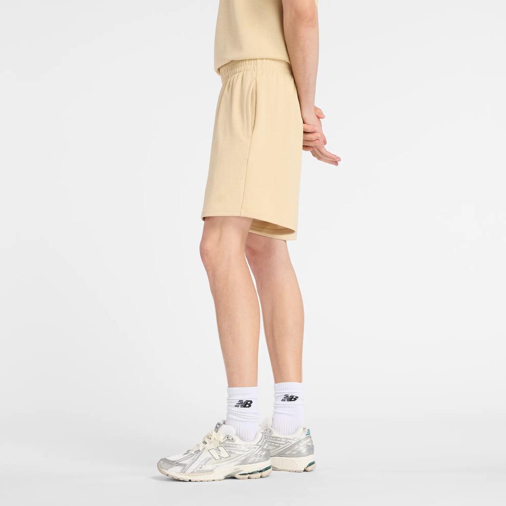 Férfi futónadrág New Balance MB61V17CABC - sárga