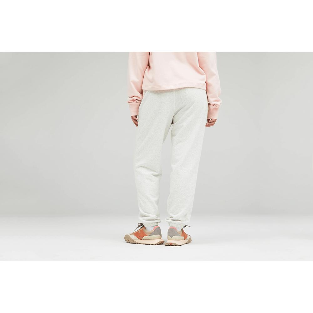 Melegítőnadrág New Balance UP21500SAH - szürke