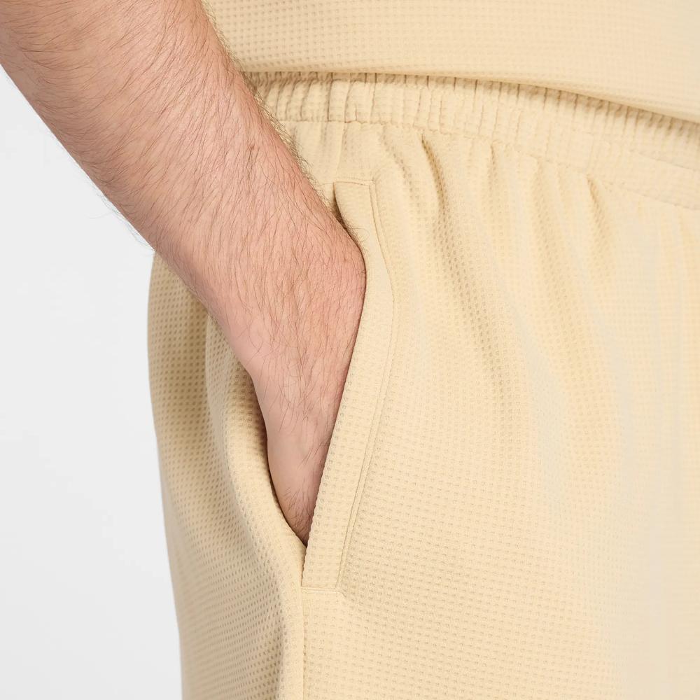 Férfi futónadrág New Balance MB61V17CABC - sárga