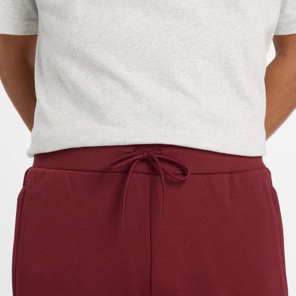 Férfi nadrág New Balance MP53501MHB - gesztenyebarna