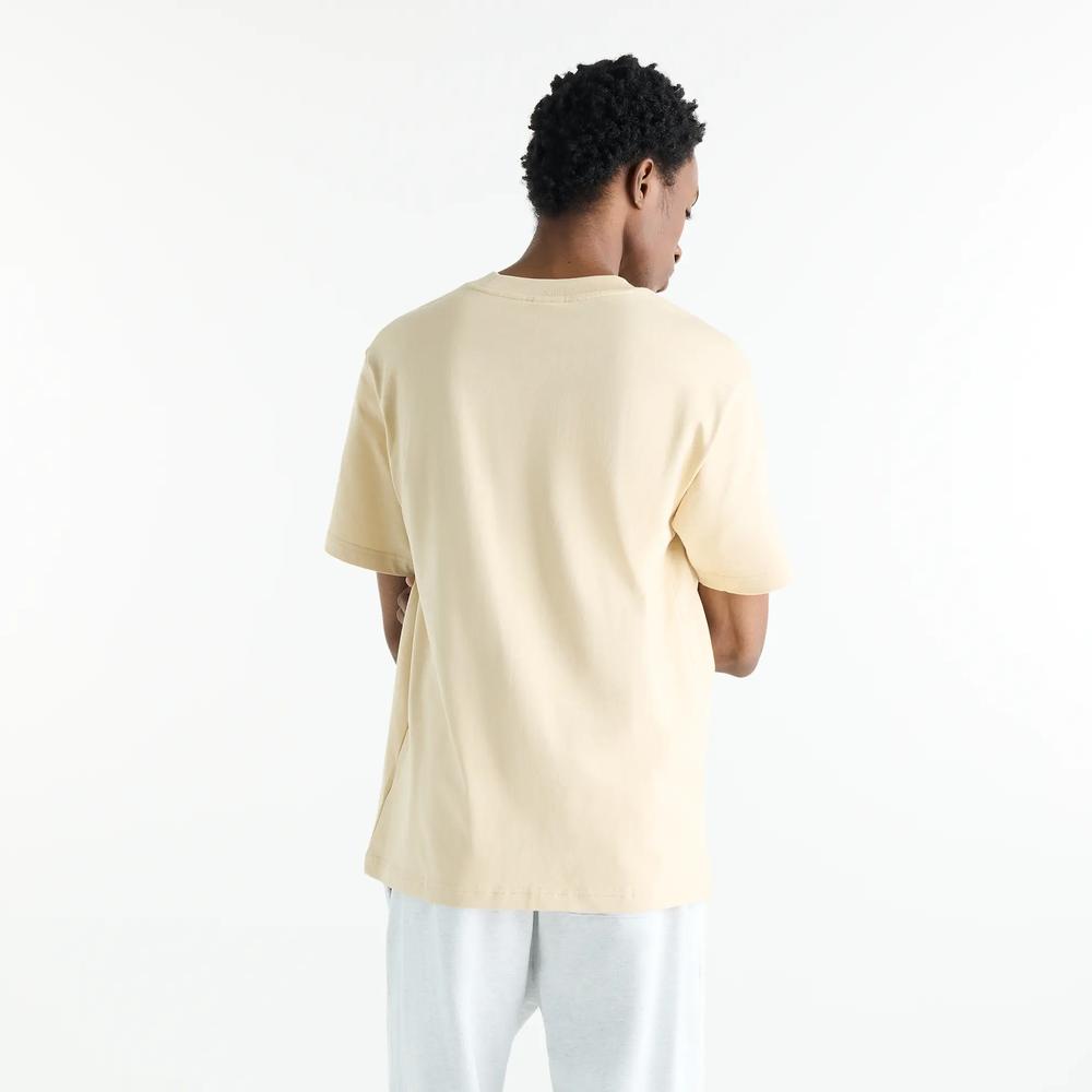Férfi futópóló New Balance MT41533ABC - bézs