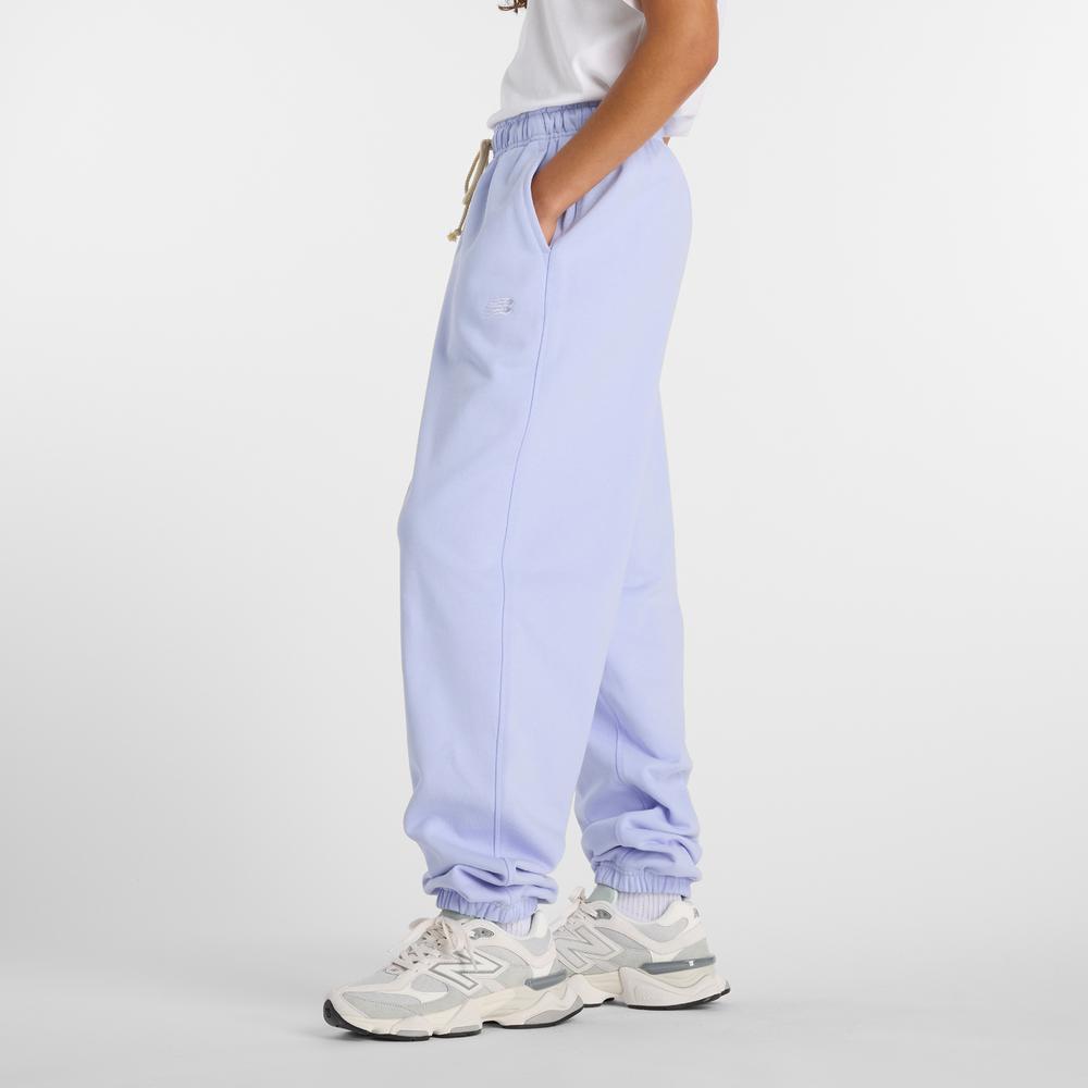 Női nadrág New Balance WP41513DYK - lila