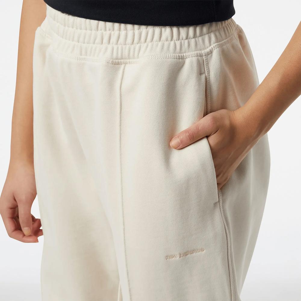 Nadrág New Balance WP23553GIE – bézs