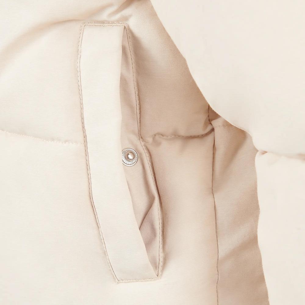 Gyerek dzseki New Balance LAKG0230BIS - bézs