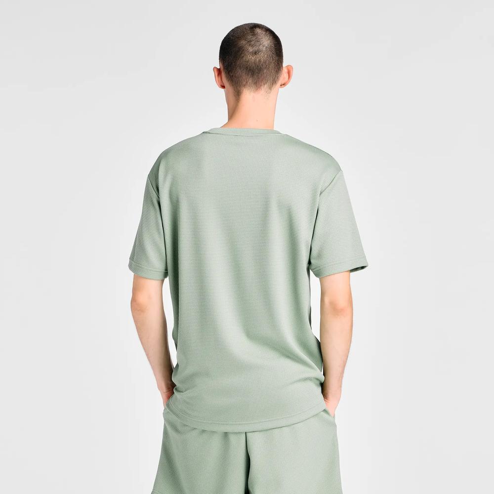 Férfi póló New Balance MT6100FRAAR - zöld