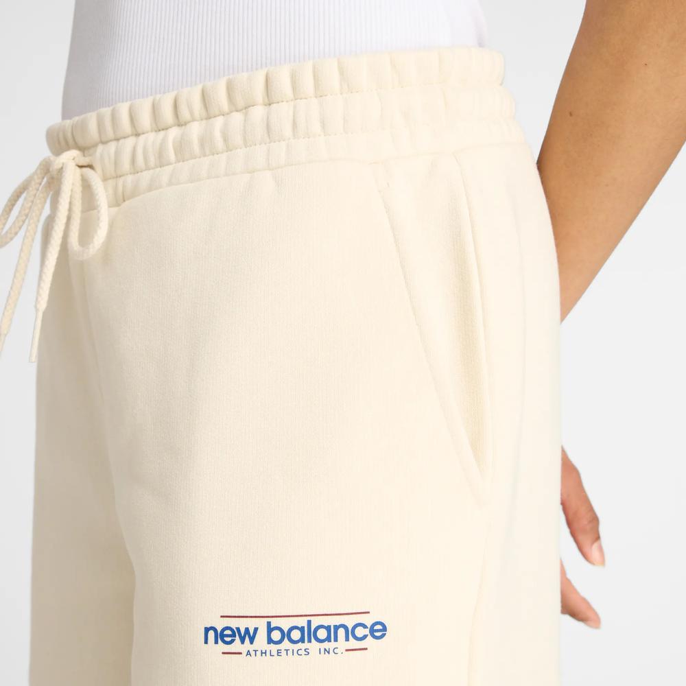 Női nadrág New Balance WP53903LIN - bézs