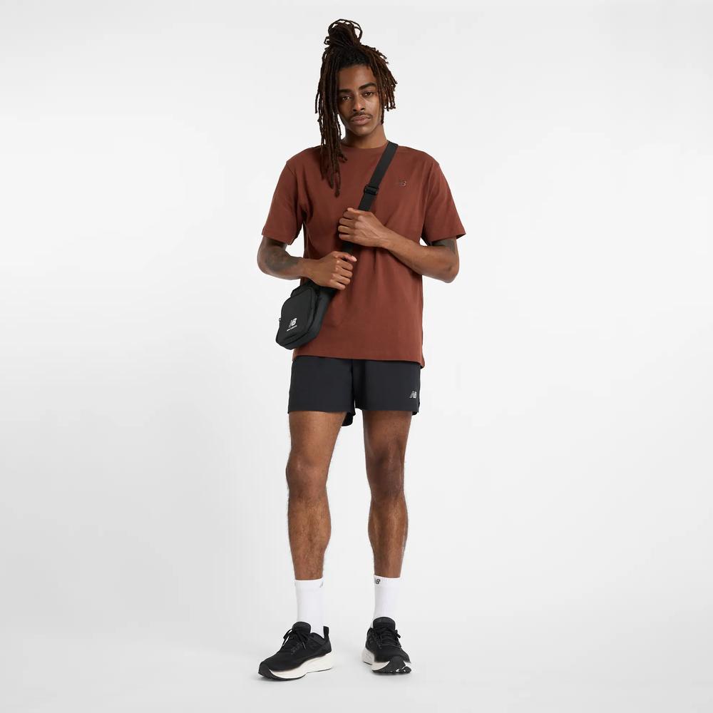 Férfi futópóló New Balance MT41533ROK - barna