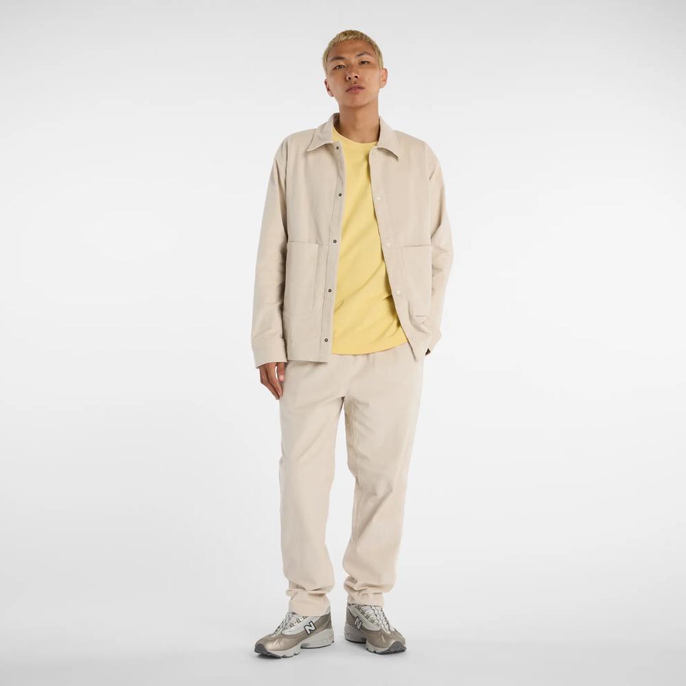 Férfi nadrág New Balance MP53521TWF - bézs