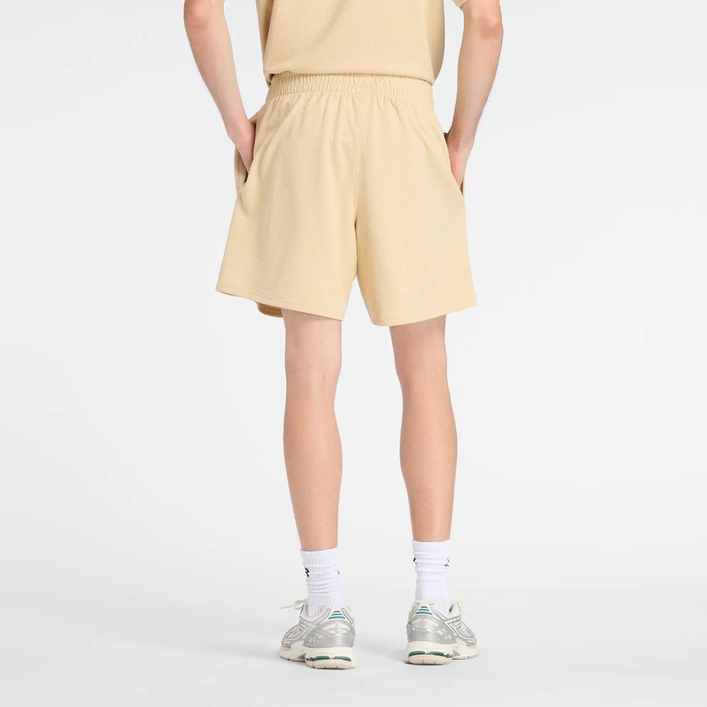 Férfi futónadrág New Balance MB61V17CABC - sárga