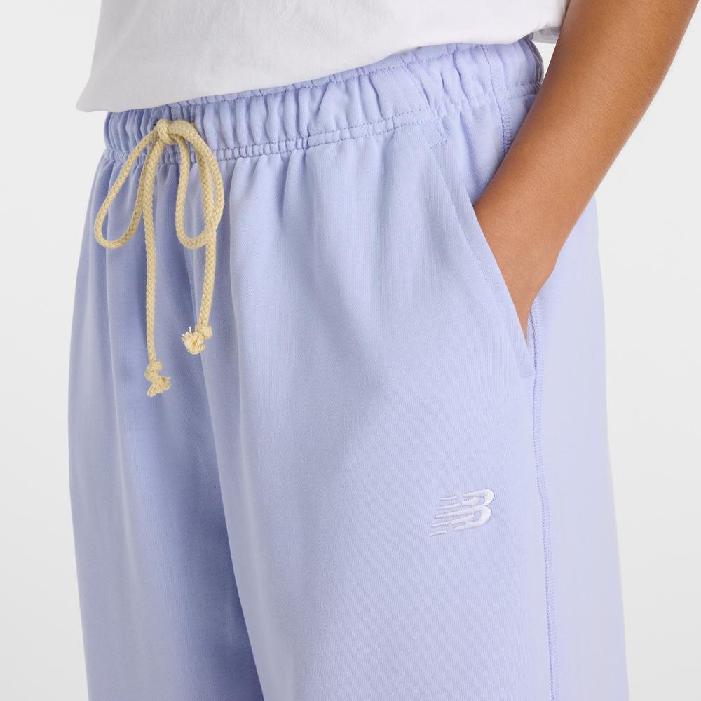 Női nadrág New Balance WP41513DYK - lila