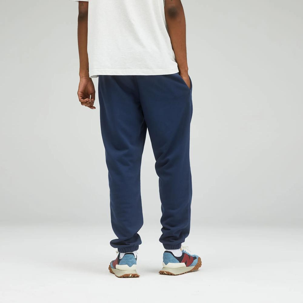 Nadrág unisex New Balance UP21500NGO – sötétkék