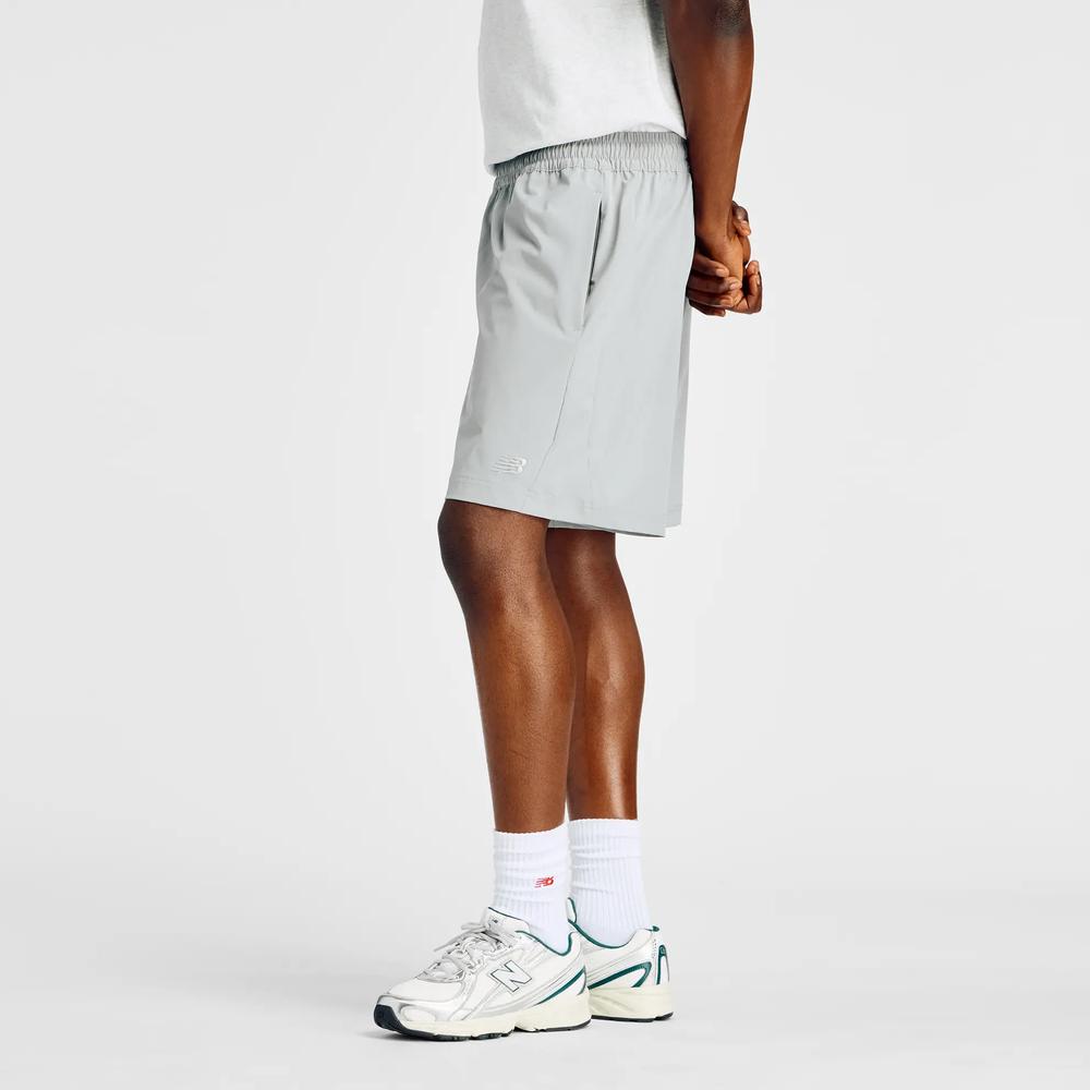 Férfi futónadrág New Balance MB6174CDYST - szürke