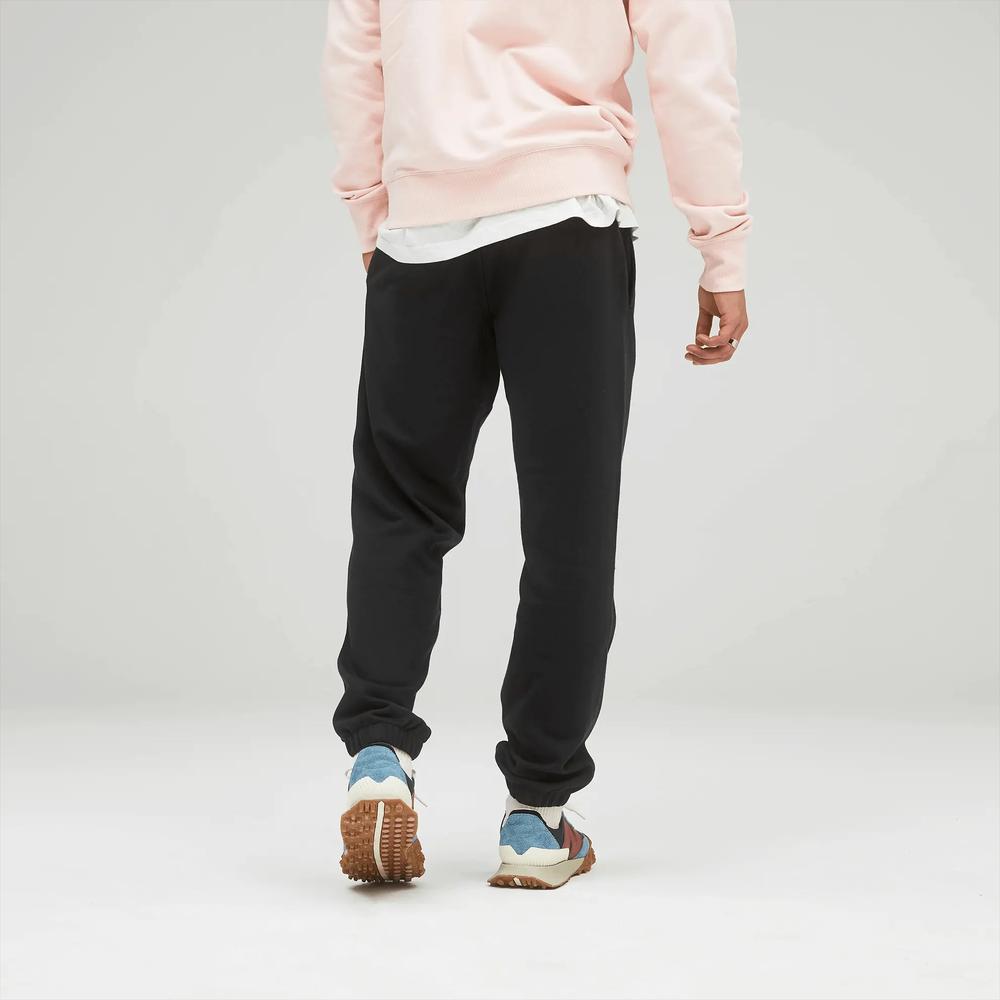 Melegítőnadrág New Balance UP21500BK - fekete